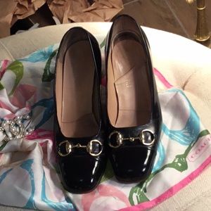 Slightly worn black leather Gucci shoes, Beautiful black with gold accents